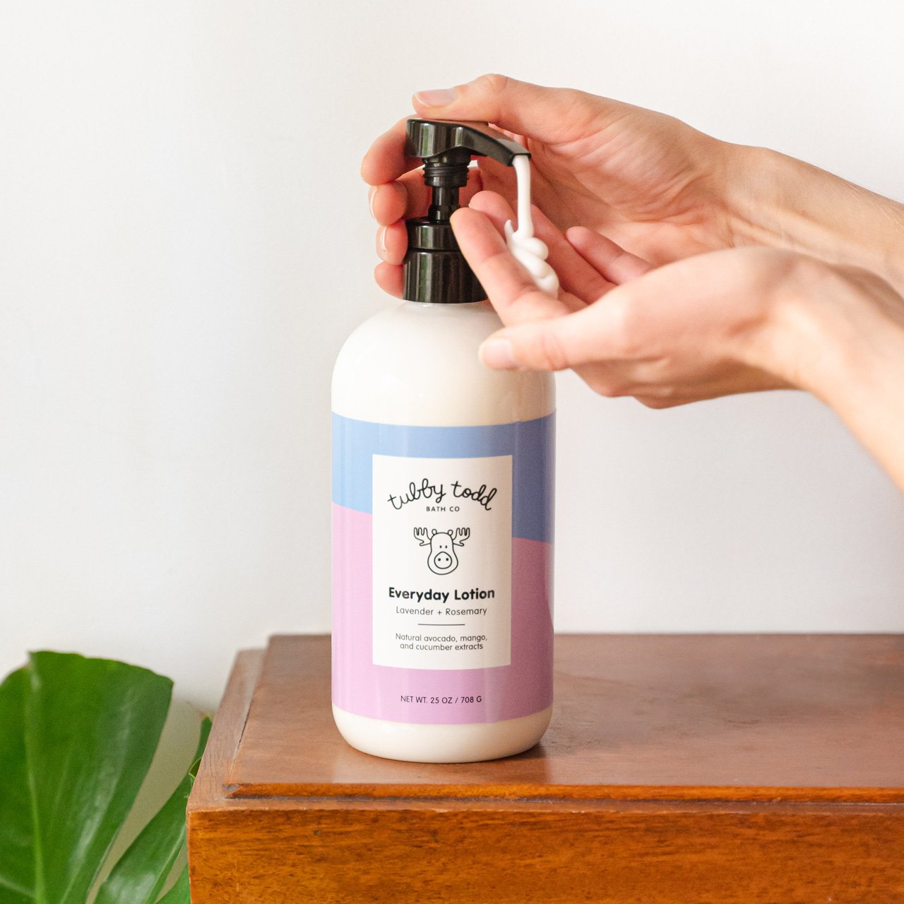 Hands pumping Extra Tubby Lavender + Rosemary Everyday Lotion